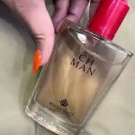ادو پرفیوم / عطر و ادکلن مردانه وودی سنس مدل سی اچ من CH Man حجم 100 میلی لیتر